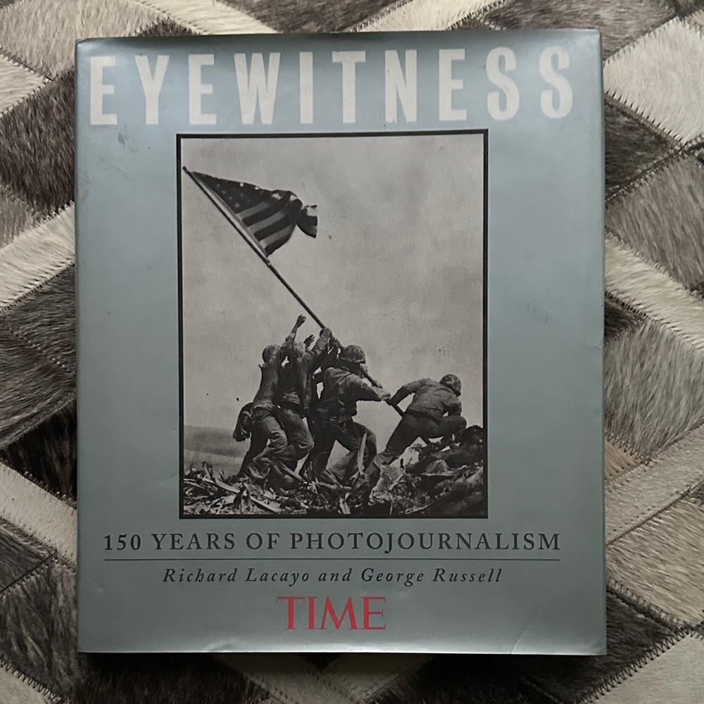 Eyewitness: 150 Years of Photojournalism – Blue Hardcover